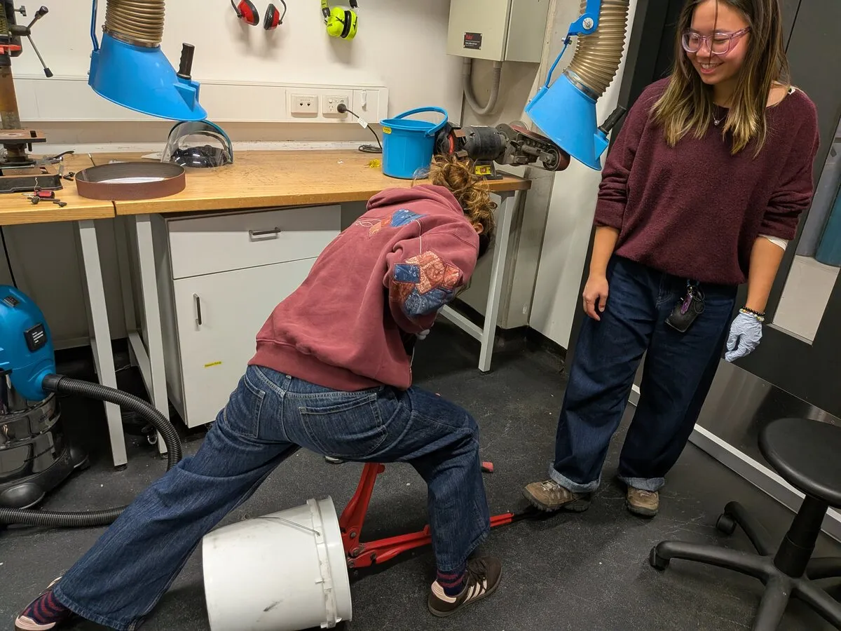 Samara and Katie preparing alloy charges in the workshop at UNSW Sydney